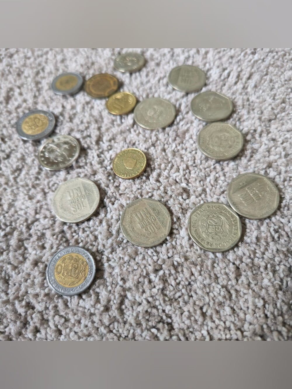 Peruvian Soles (PEN) from various years, including the "nuevo sol" designation